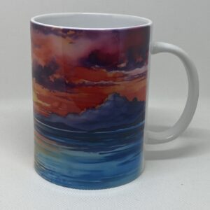 A mug with an ocean scene painted on it.