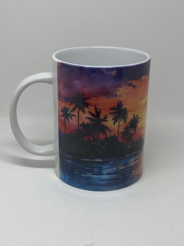 A coffee mug with an image of the ocean and palm trees.