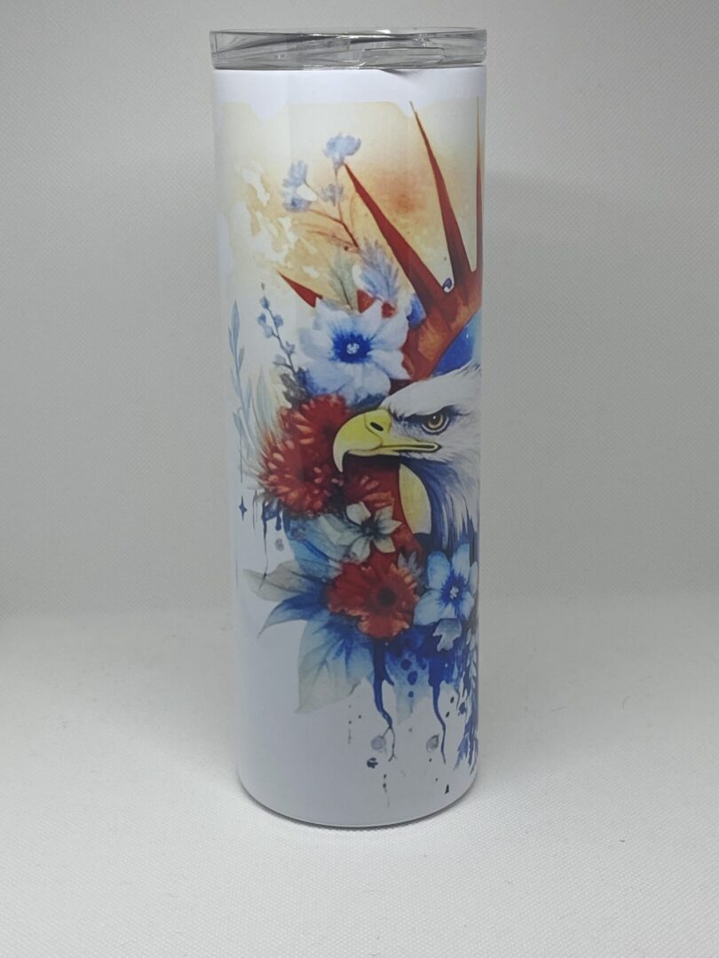 A white vase with a bird and flowers on it.