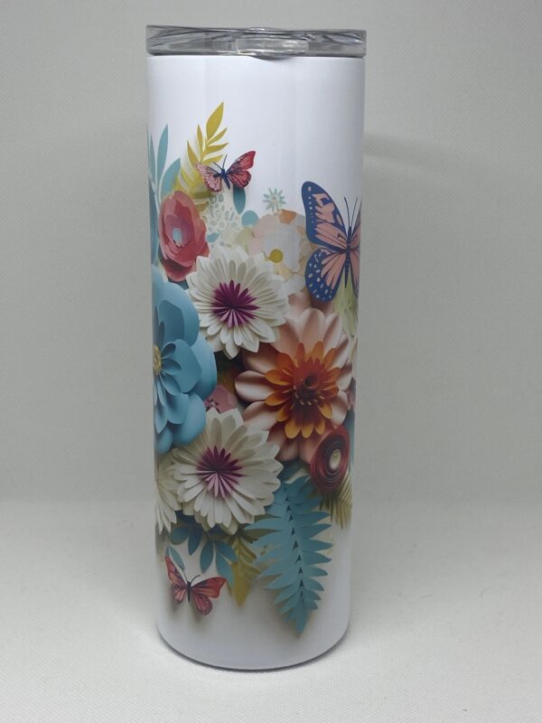 A white vase with flowers and butterflies on it.