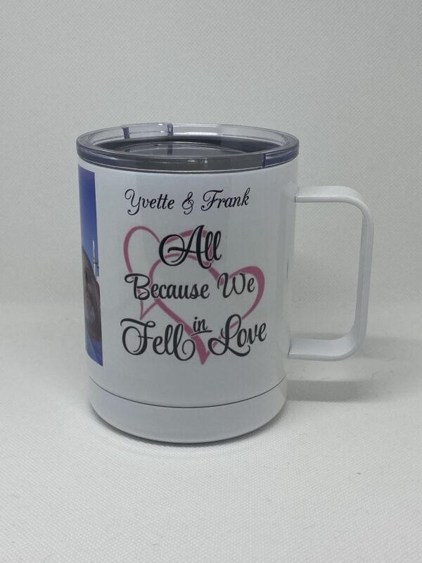 A white cup with a picture of someone and the words " all because we fell in love ".