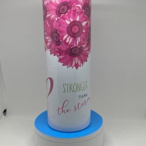 A pink flower design on the side of a water bottle.