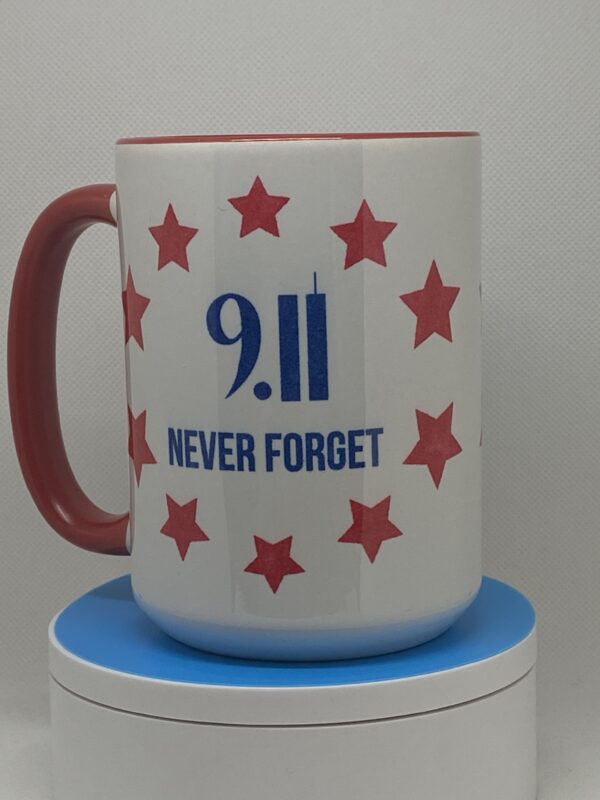 A coffee mug with the words " 9. 1 1 never forget ".