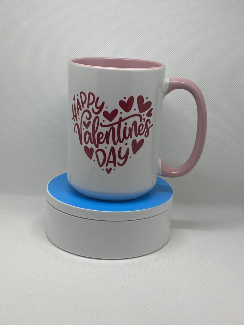 A mug sitting on top of a coaster.