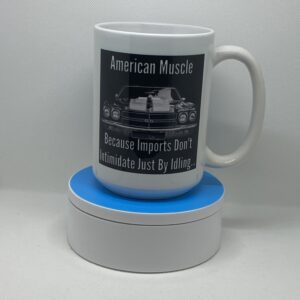 A mug sitting on top of a blue coaster.