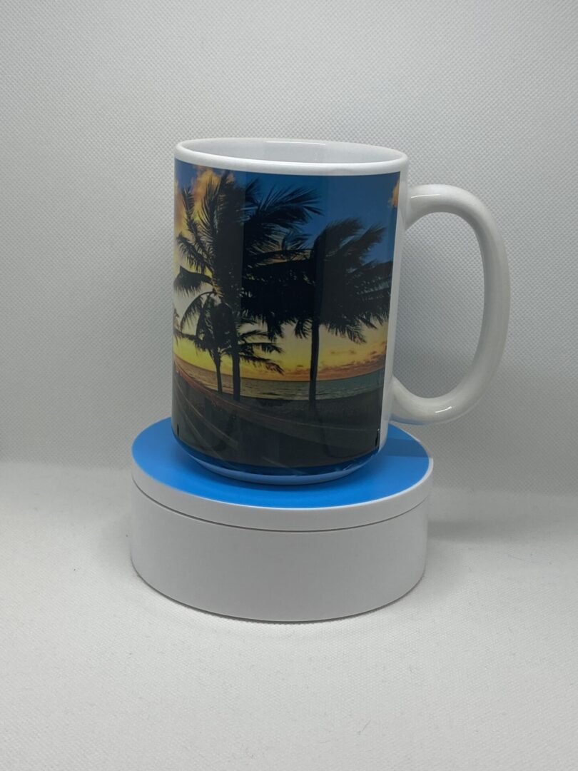 A coffee mug sitting on top of a coaster.