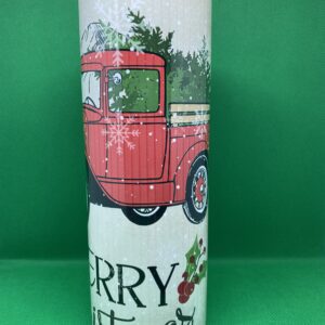 A red truck with christmas trees on it.