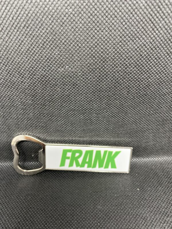 A bottle opener with the name frank written on it.