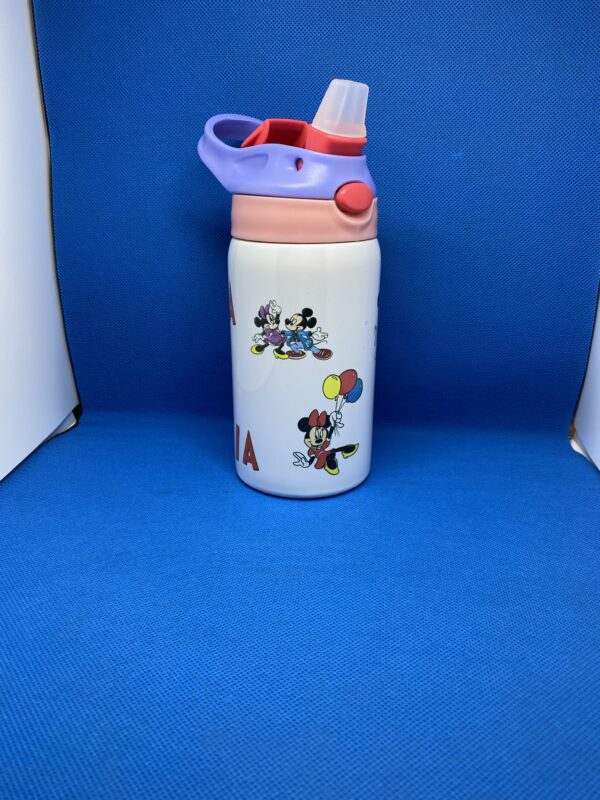 A water bottle with mickey mouse and minnie mouse on it.