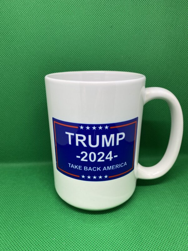 A coffee mug with the name of president donald trump on it.