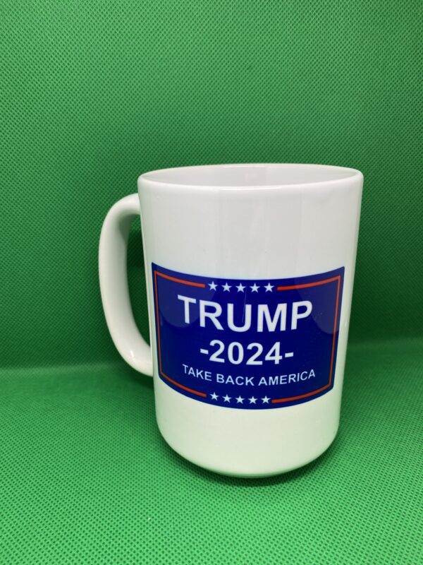 A coffee mug with the name of president trump on it.