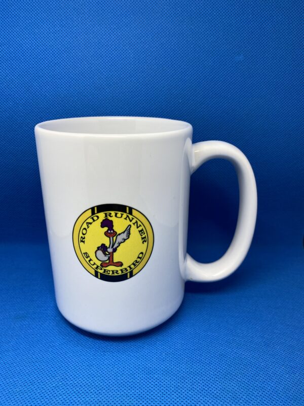 A white coffee mug with the logo of gold diggers of hollywood.