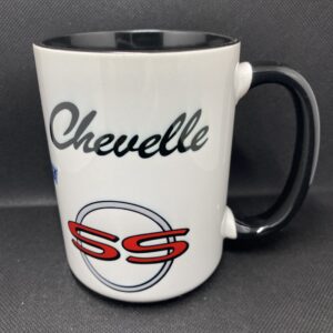 A white and black coffee mug with the word chevelle written on it.