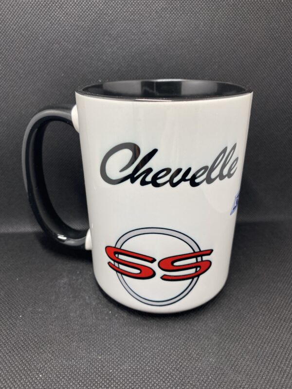 A white and black coffee mug with the words chevelle written on it.