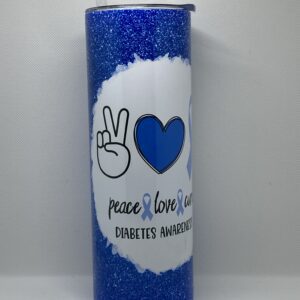 A blue candle with the words peace love and diabetes written on it.