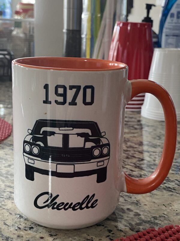 A coffee mug with the name of chevelle on it.