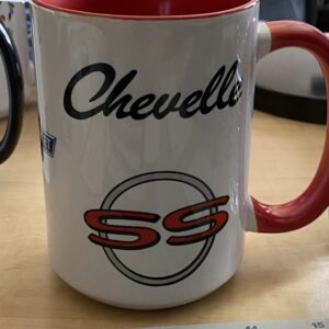 A coffee mug with the name of chevelle on it.