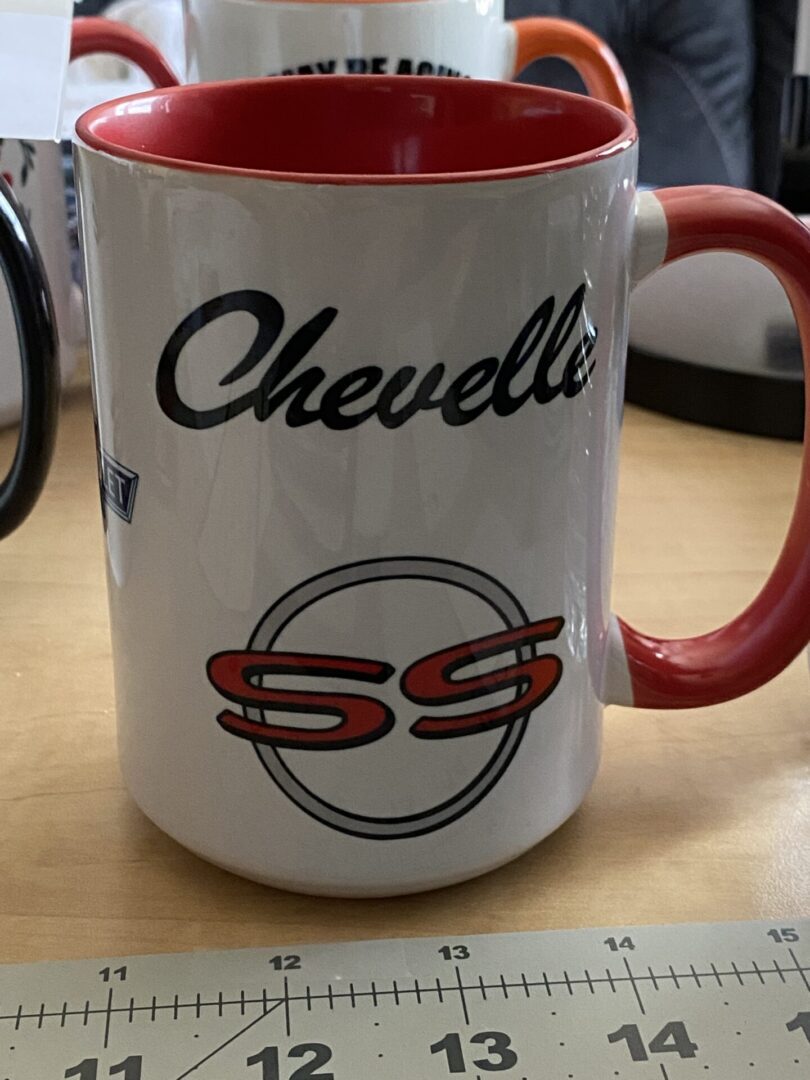 A coffee mug with the name of chevelle on it.