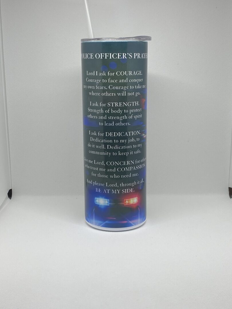 A blue candle with the words " police officer 's prayer ".