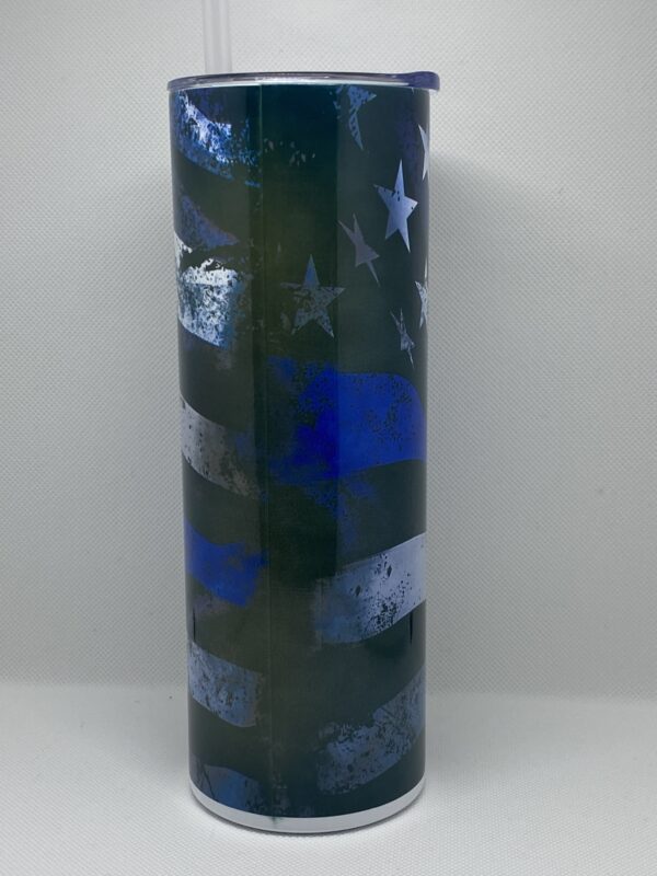 A tall glass vase with blue and white stars.