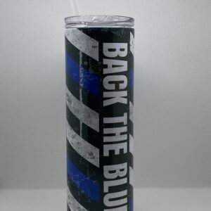 A tall glass with the words " back the blue ".