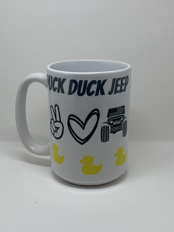 A white coffee mug with duck, peace sign and jeep designs.