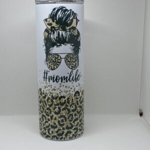 A tall glass with leopard print on it