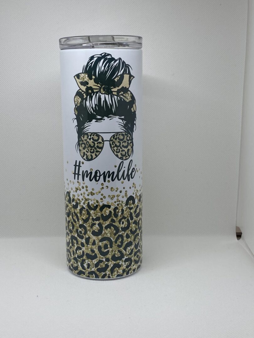 A tall glass with leopard print on it