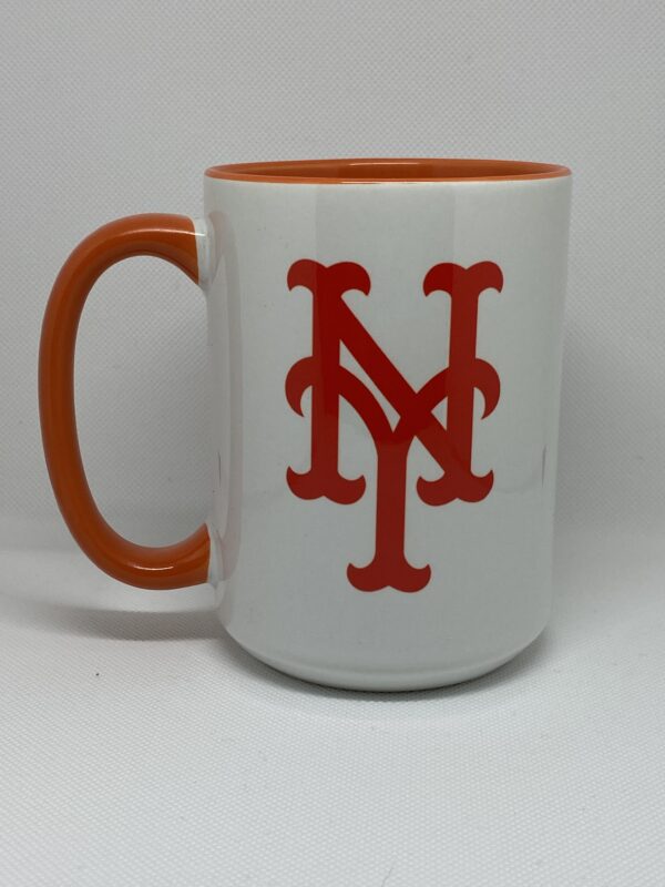 A coffee mug with the letter n on it.