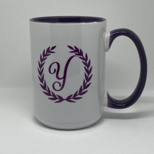 A coffee mug with the letter y on it.