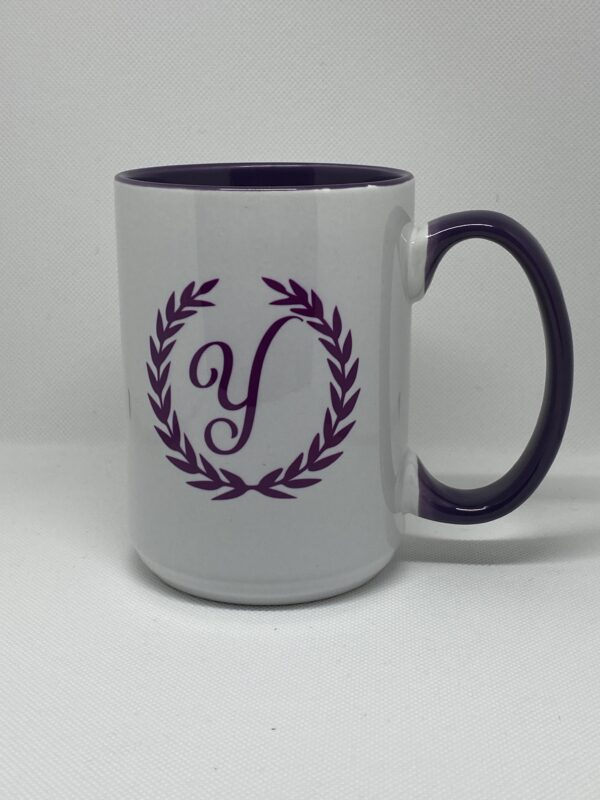 A coffee mug with the letter y on it.