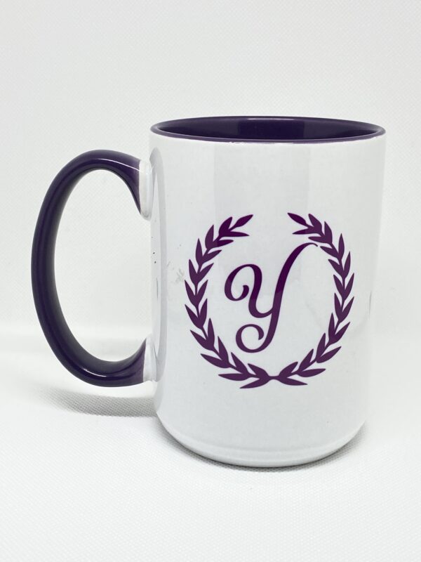 A coffee mug with the letter y on it.