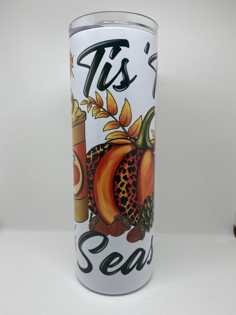 A candle that has some type of design on it.