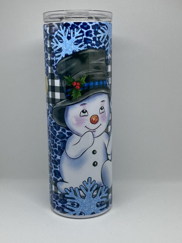 A blue and white vase with a snowman on it