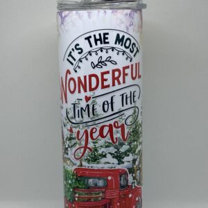 A red truck is on the side of the road.