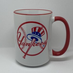 A yankees coffee mug with the logo of the team.
