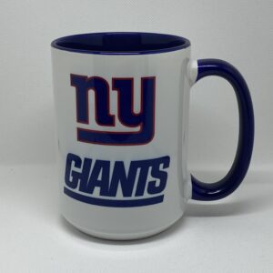 A coffee mug with the new york giants logo on it.