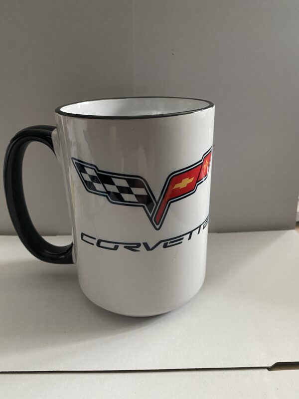 A coffee mug with the word corvette written on it.