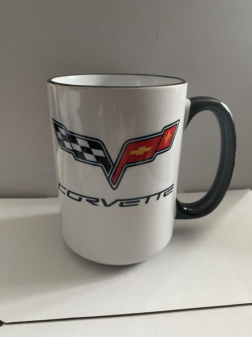 A coffee mug with the word corvette written on it.