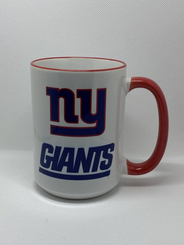 A giants coffee mug is shown with red rim.