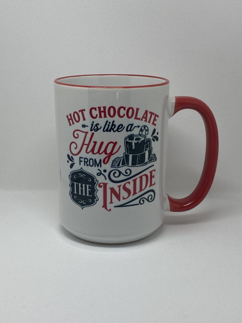 A coffee mug with the words " hot chocolate is like a hug from inside ".