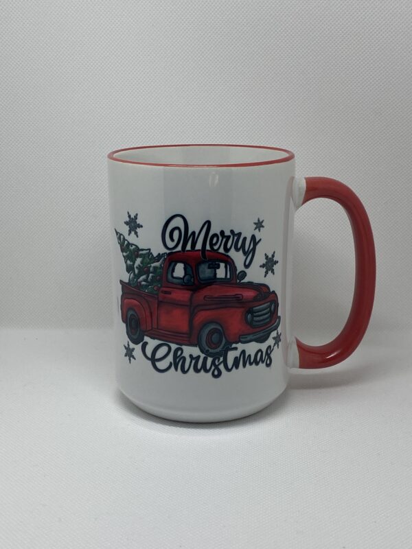 A red and white mug with a truck on it