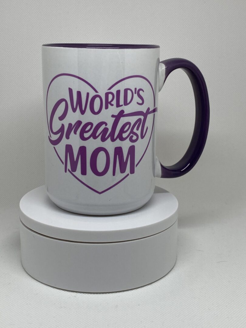 A coffee mug that says world 's greatest mom.