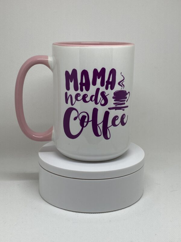 A coffee mug that says mama needs coffee.