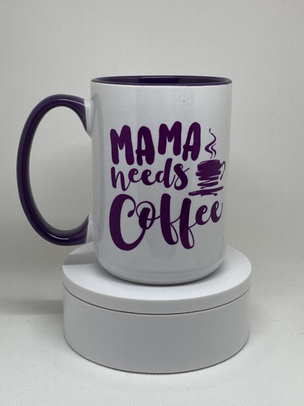 A coffee mug that says mama needs coffee.