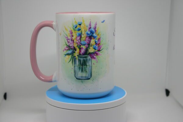 A mug with flowers painted on it